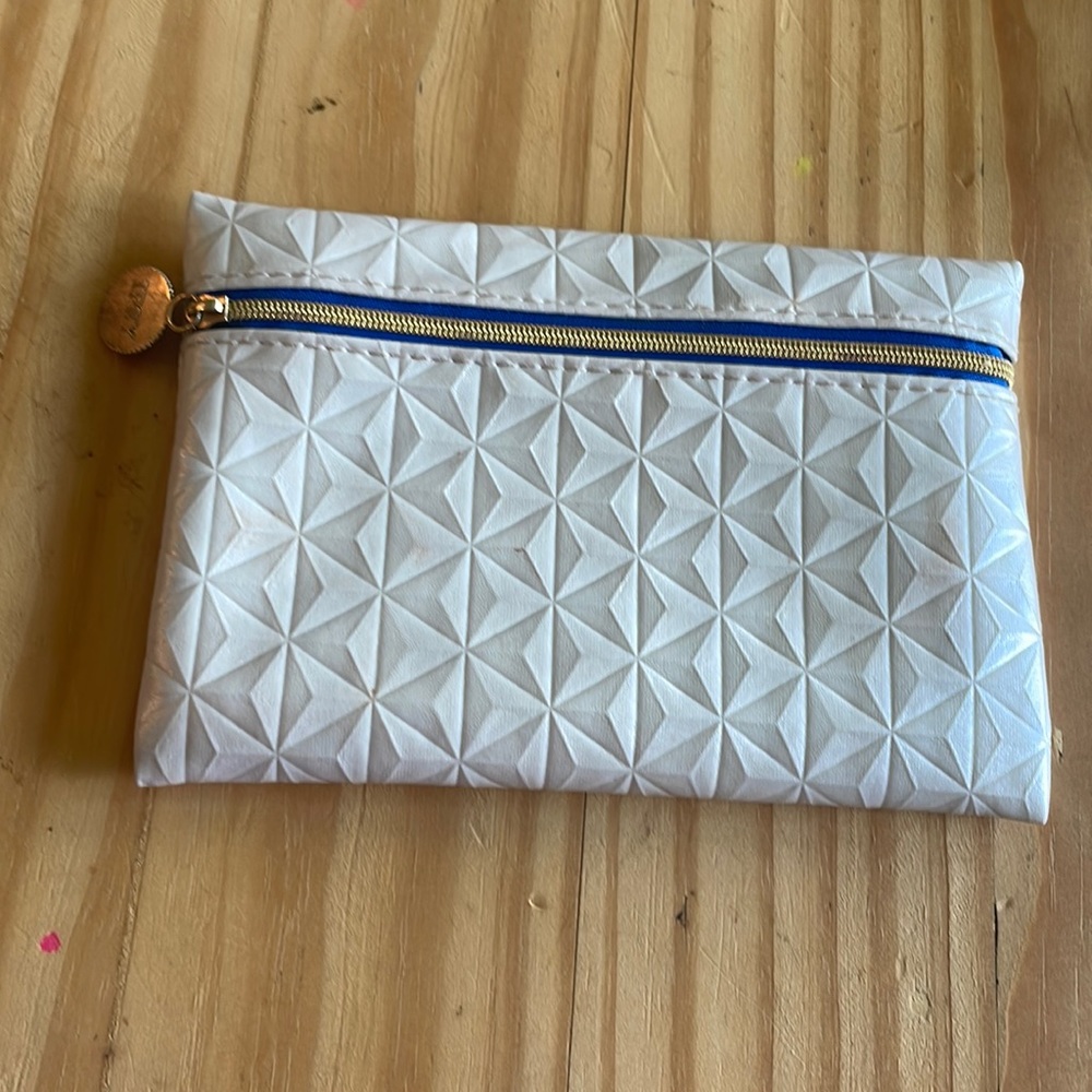 White diamond shaped ipsy bag